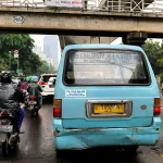 Daily commuter traffic highlighting the risks of driving unsafe vehicles and repeated breakdowns